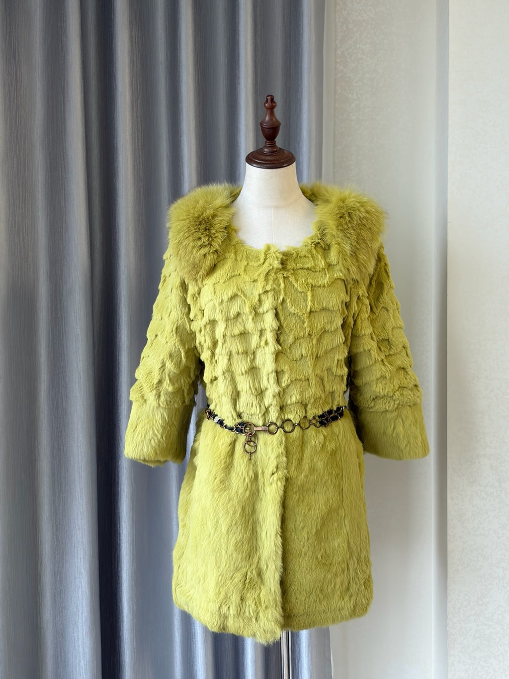 Mustard green rabbit fur textured mid-length fur coat features fluffy shoulder trim,