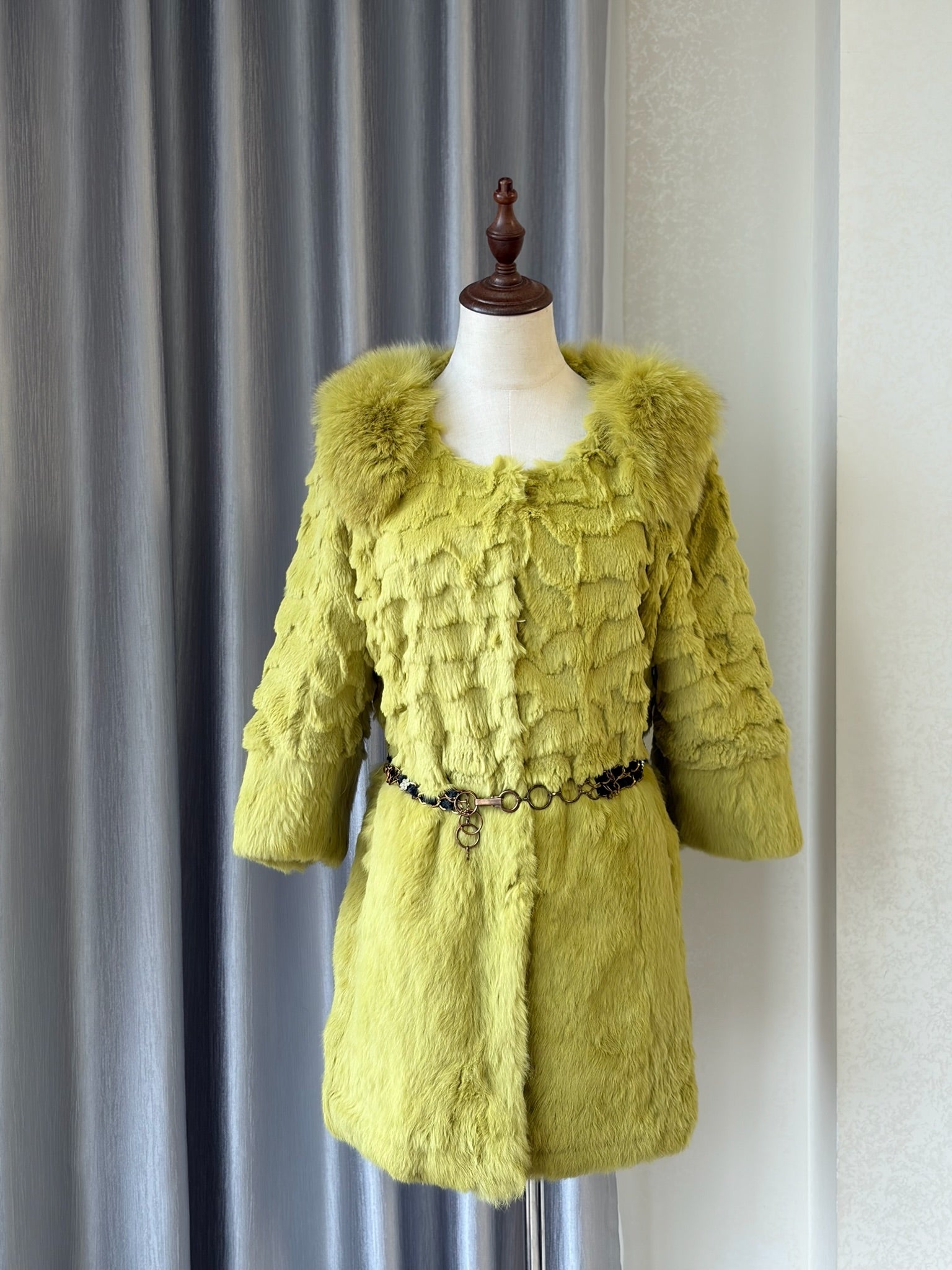 Mustard green rabbit fur textured mid-length fur coat features fluffy shoulder trim,