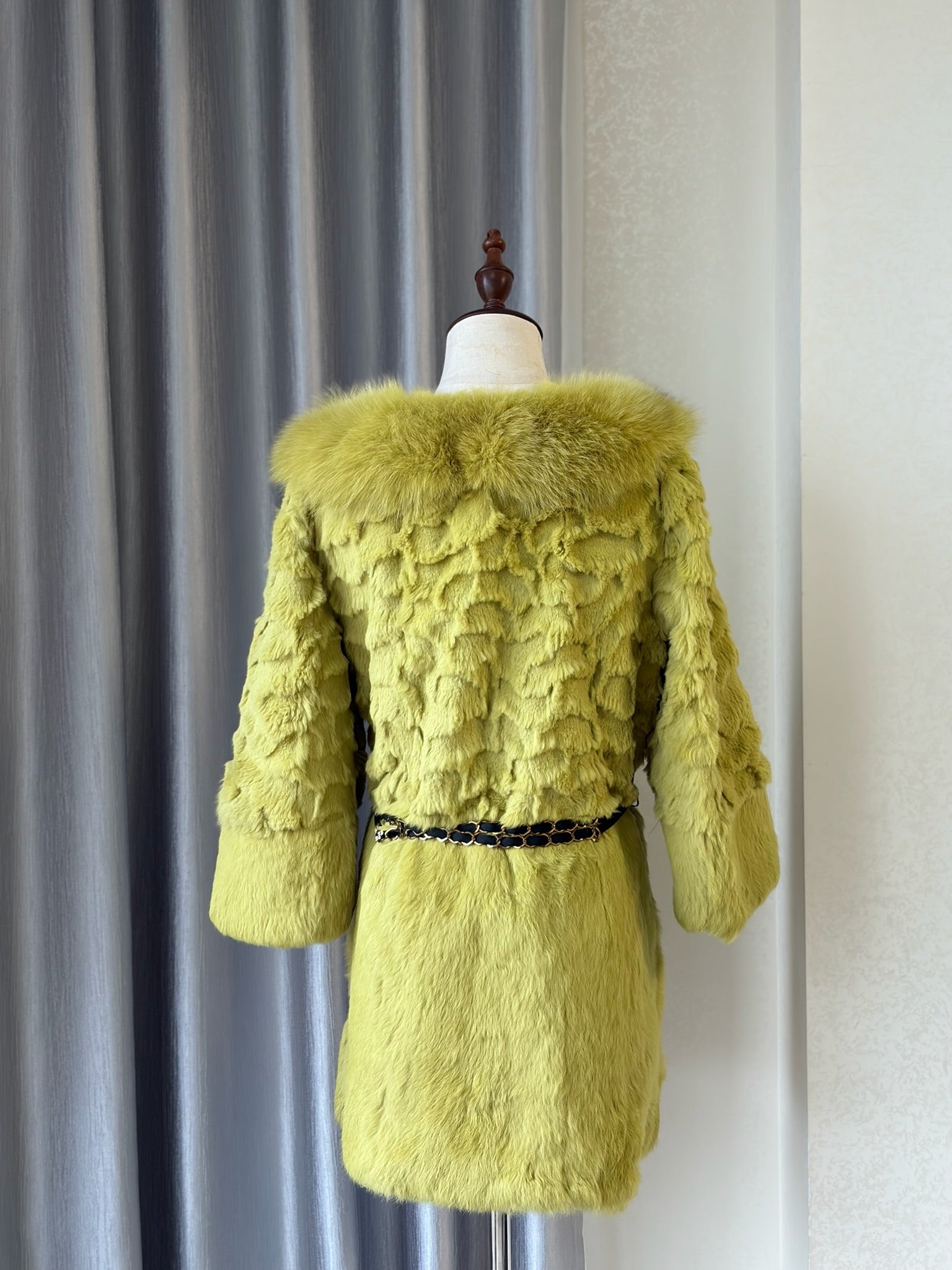 Mustard green rabbit fur textured mid-length fur coat features fluffy shoulder trim,