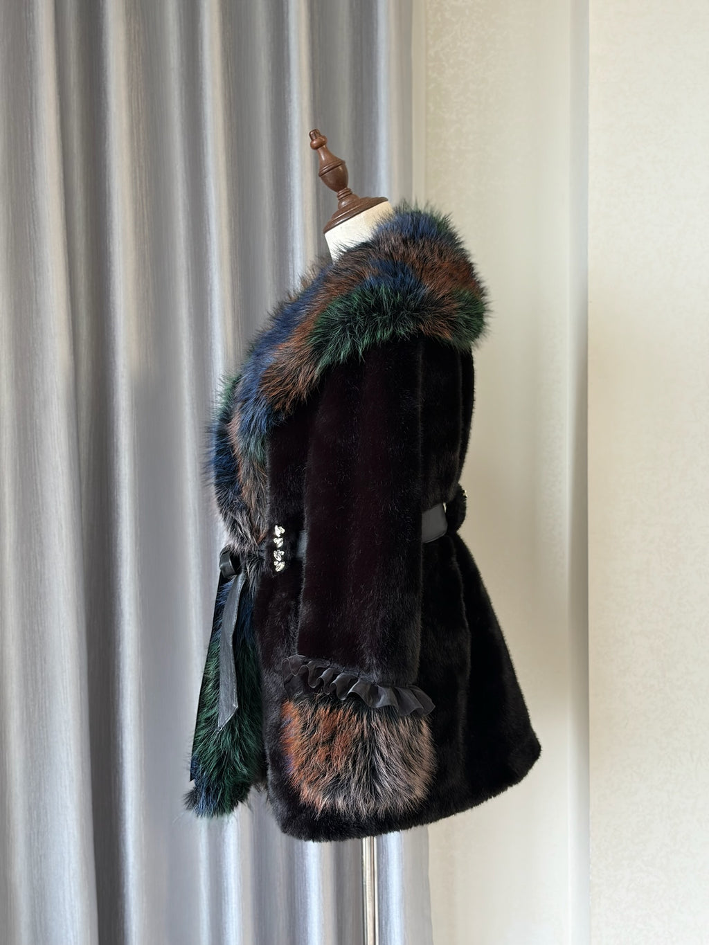 Black plush fur mid-length coat trimmed with multi-toned mixed fur on collar and cuffs