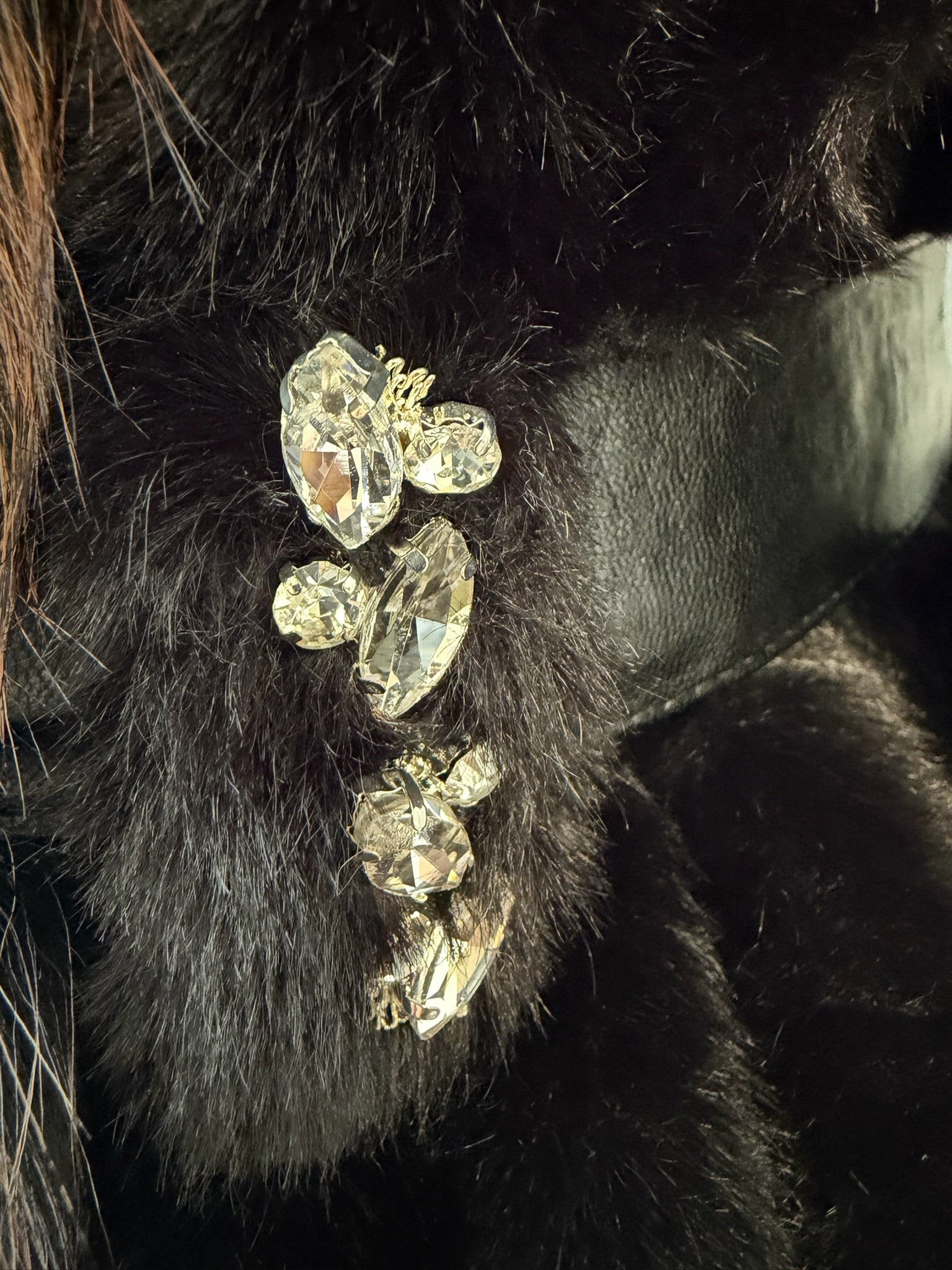 Black plush fur mid-length coat trimmed with multi-toned mixed fur on collar and cuffs
