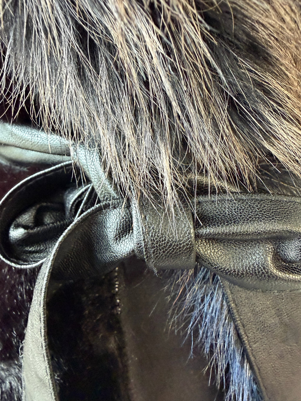 Black plush fur mid-length coat trimmed with multi-toned mixed fur on collar and cuffs