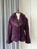 Rich burgundy rabbit fur cropped jacket paired with oversized fluffy fox fur lapel