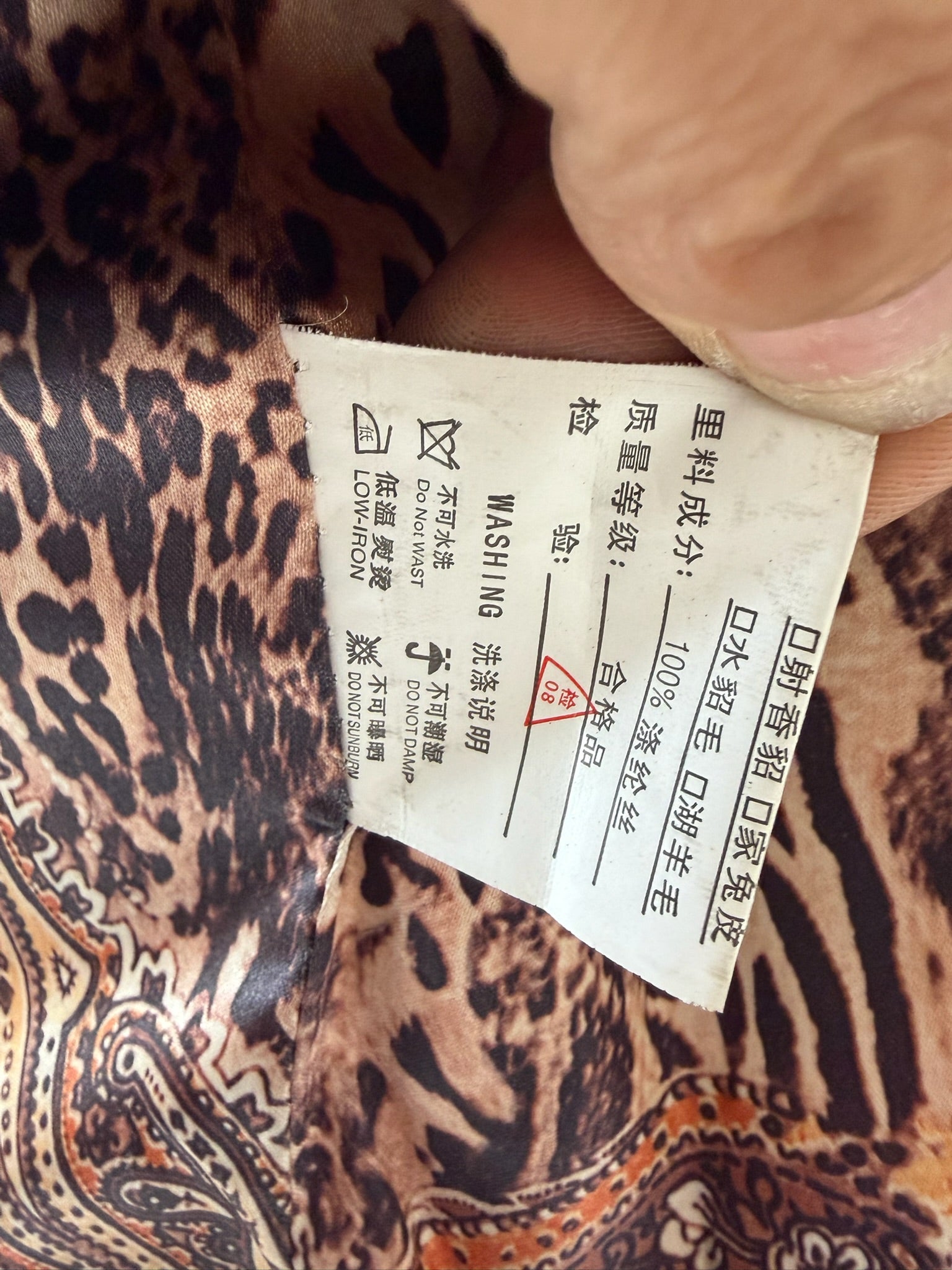Earthy gold spotted fur cropped jacket with oversized thick fur lapel
