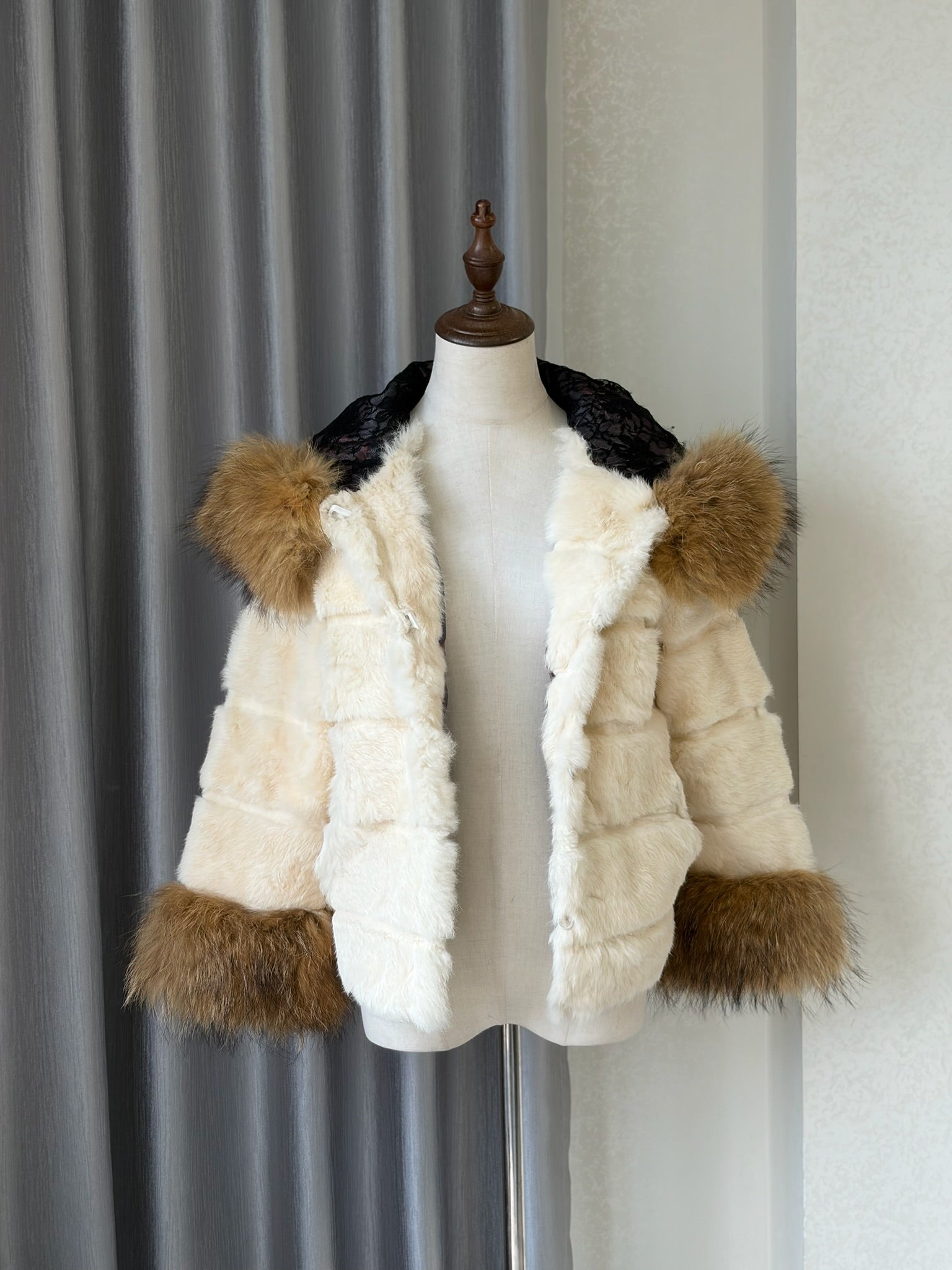 Cream-white horizontally-seamed fur jacket