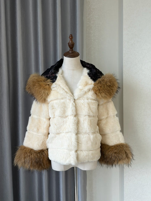 Cream-white horizontally-seamed fur jacket