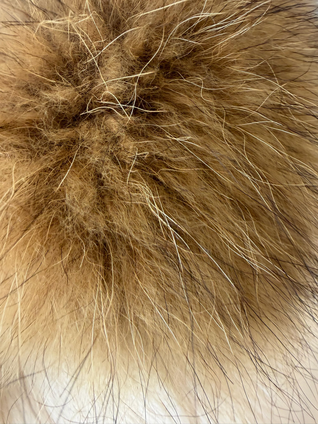 Cream-white horizontally-seamed fur jacket