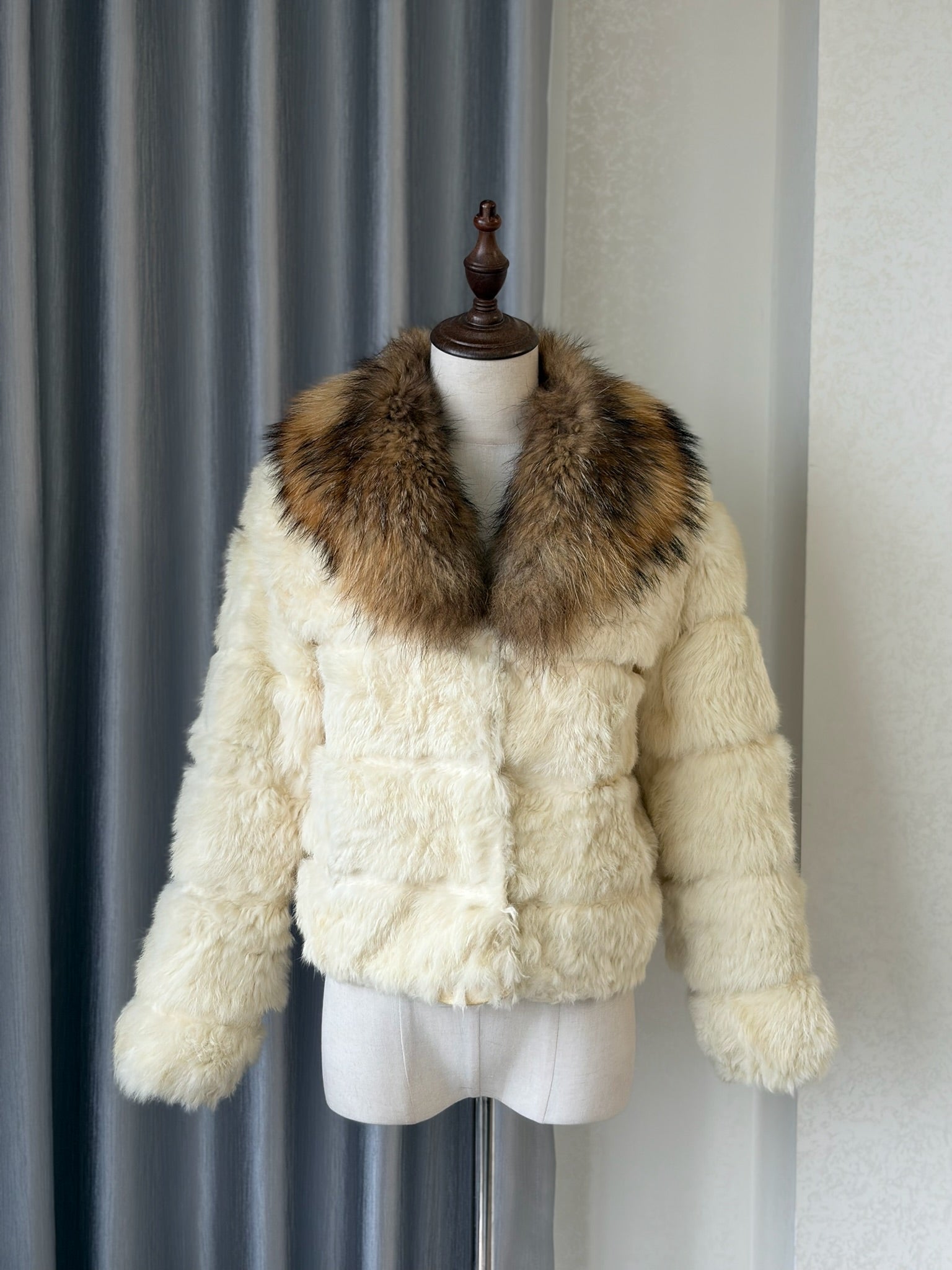 Off-white horizontally segmented cropped fur coat