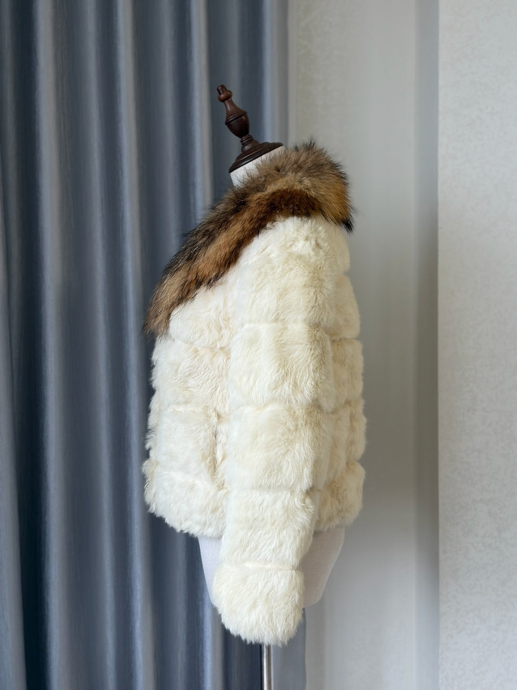 Off-white horizontally segmented cropped fur coat