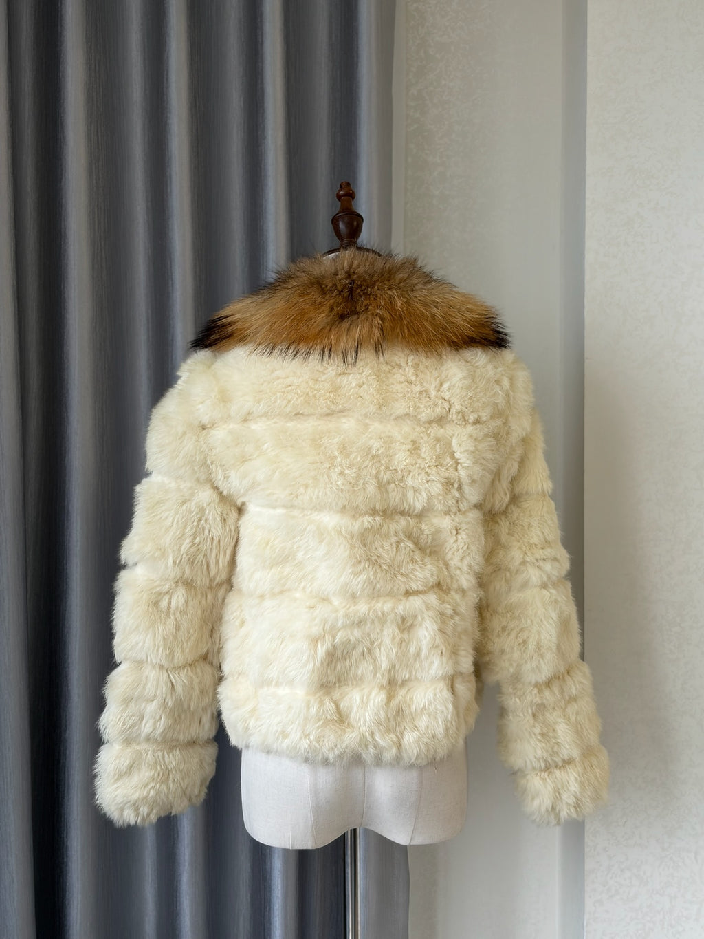 Off-white horizontally segmented cropped fur coat