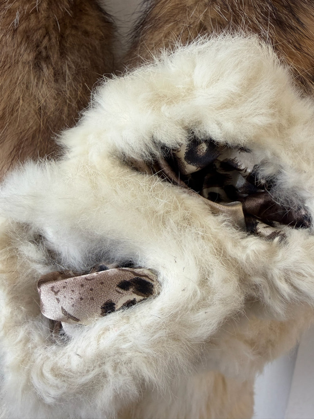 Off-white horizontally segmented cropped fur coat